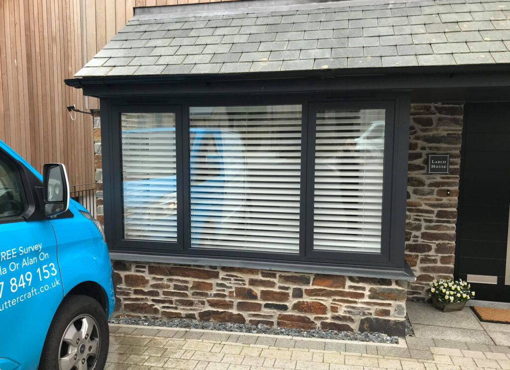 Wooden Venetian Blinds in Bay Window