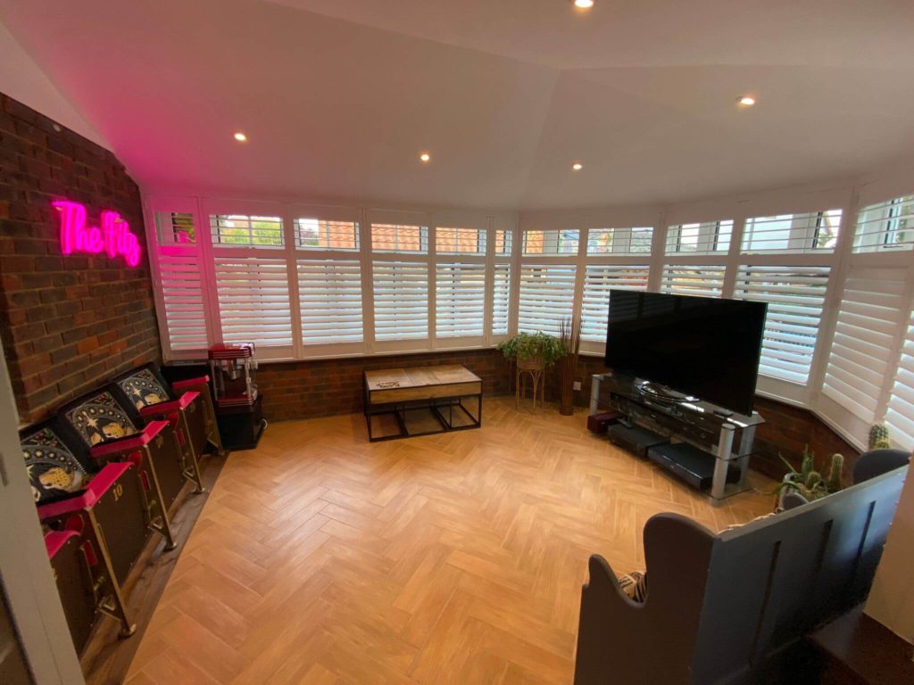 Large Bay Window Shutters in Movie Room