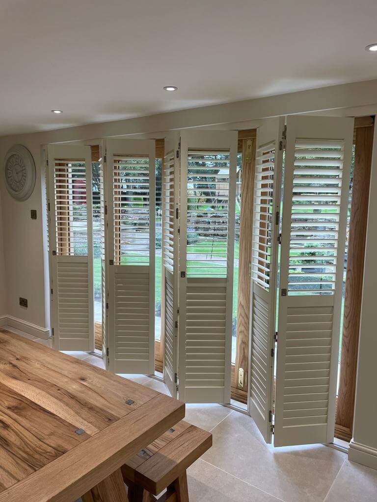 Pennines Bi-fold Track Shutters French doors Dining room