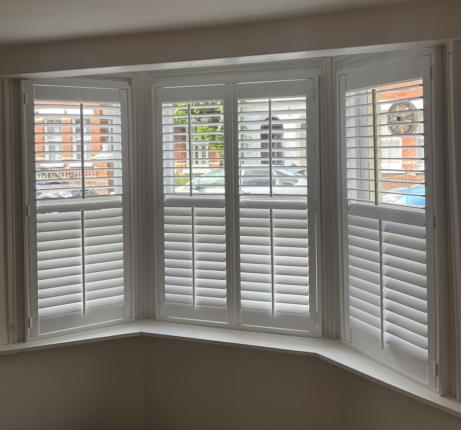 Pure white window shutters in Henley Bay Window