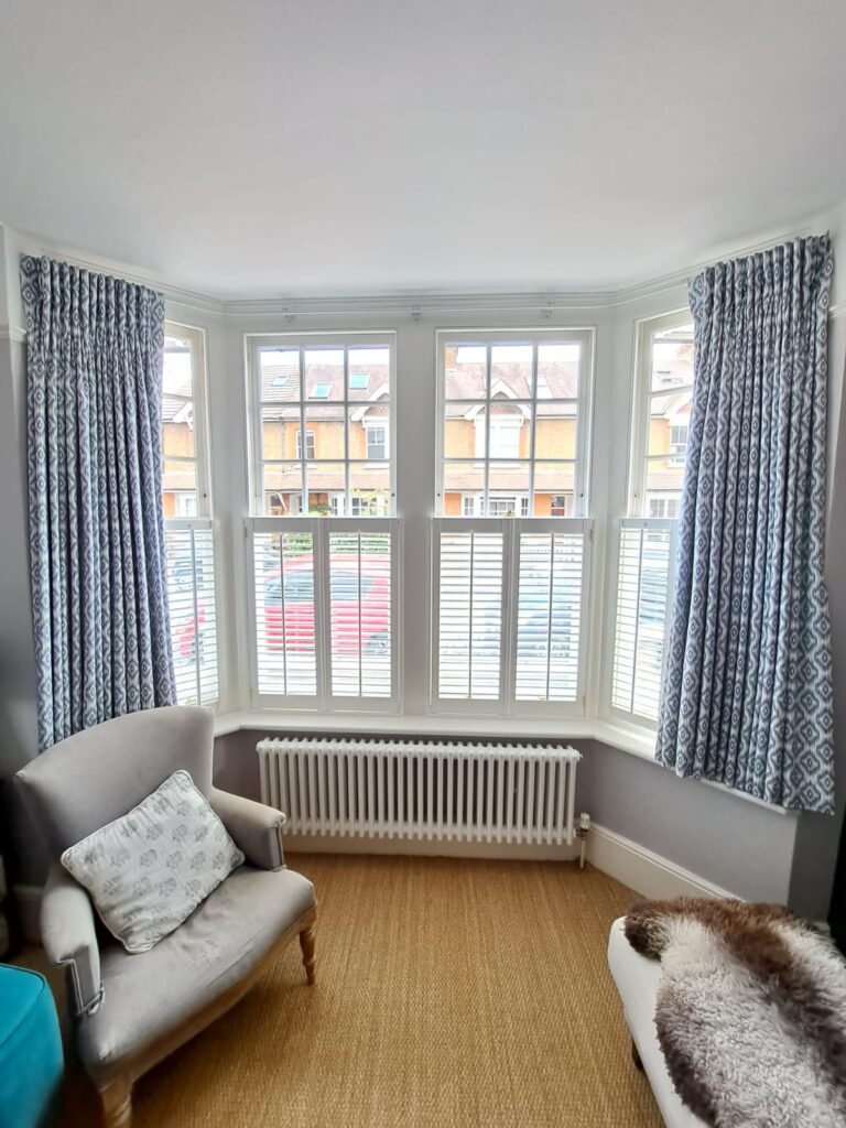 Cafe style shutters bay window Shuttercraft Bedford