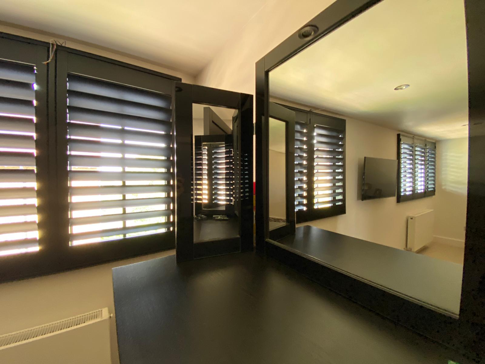 Black Cuba with 89mm louvered split panels fitted in Watford.