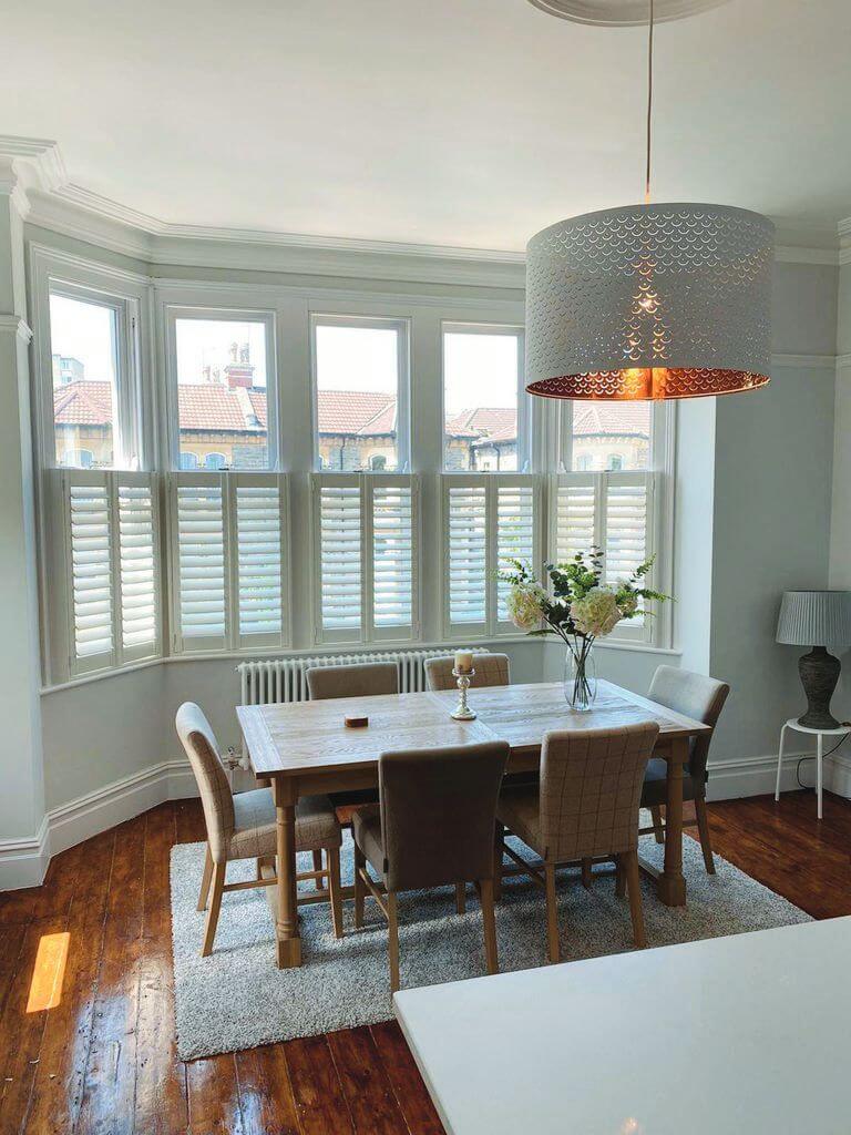 cafe shutters in bay window