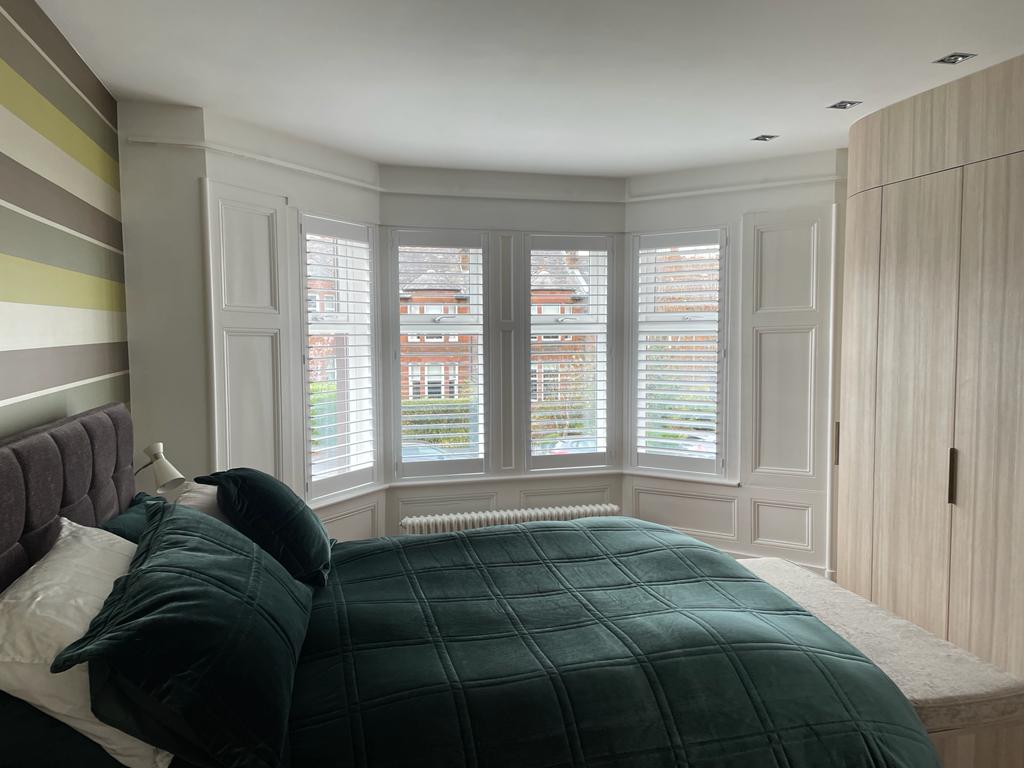Beautful White Bay Window Bedroom Shutters