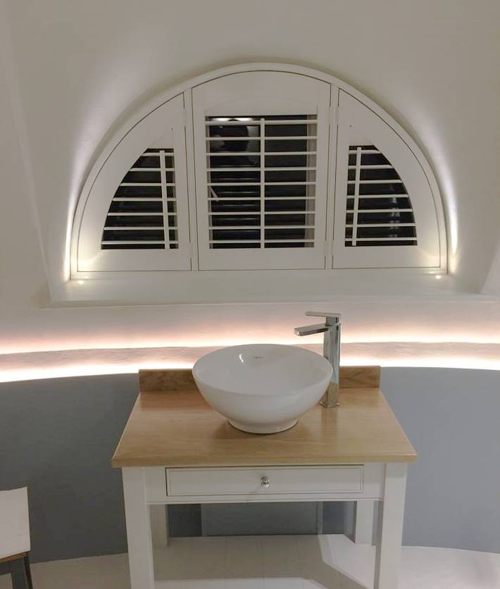 louvres in arch shaped window