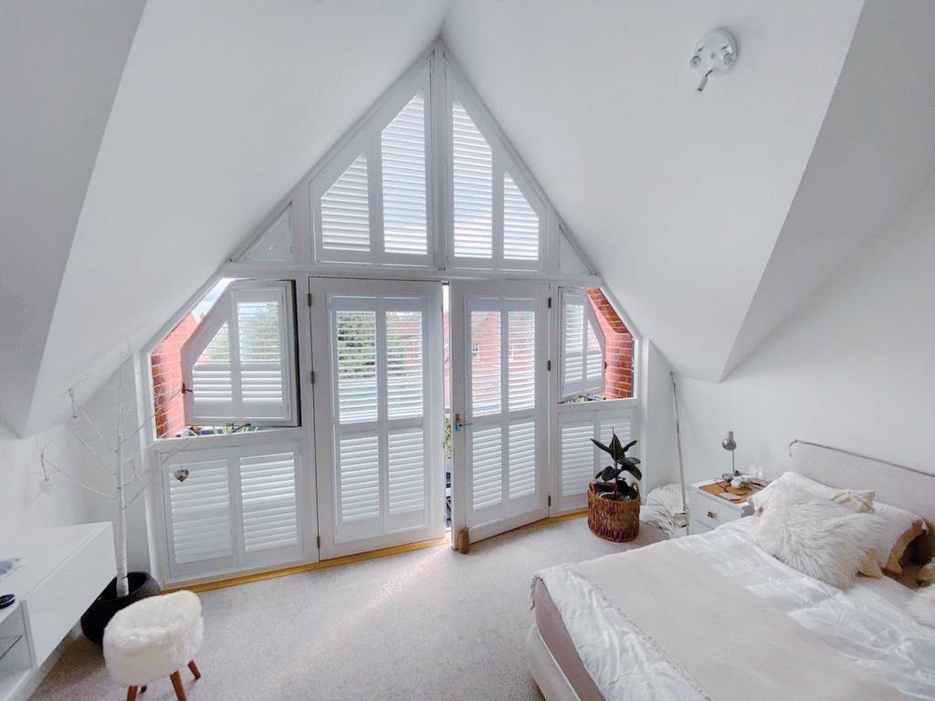 Triangular window shutters