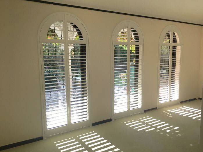 privacy and light through arched window