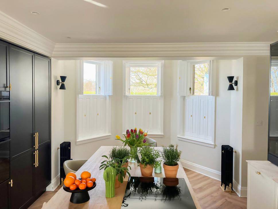 solid shutters in bay window