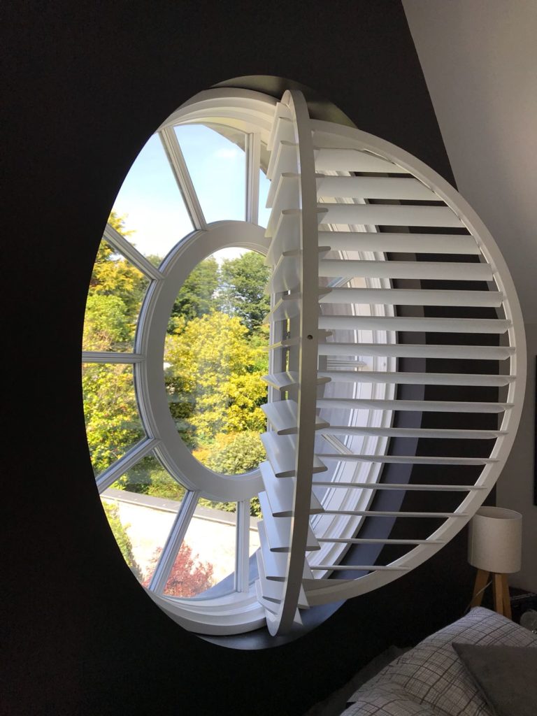 open round window shutter