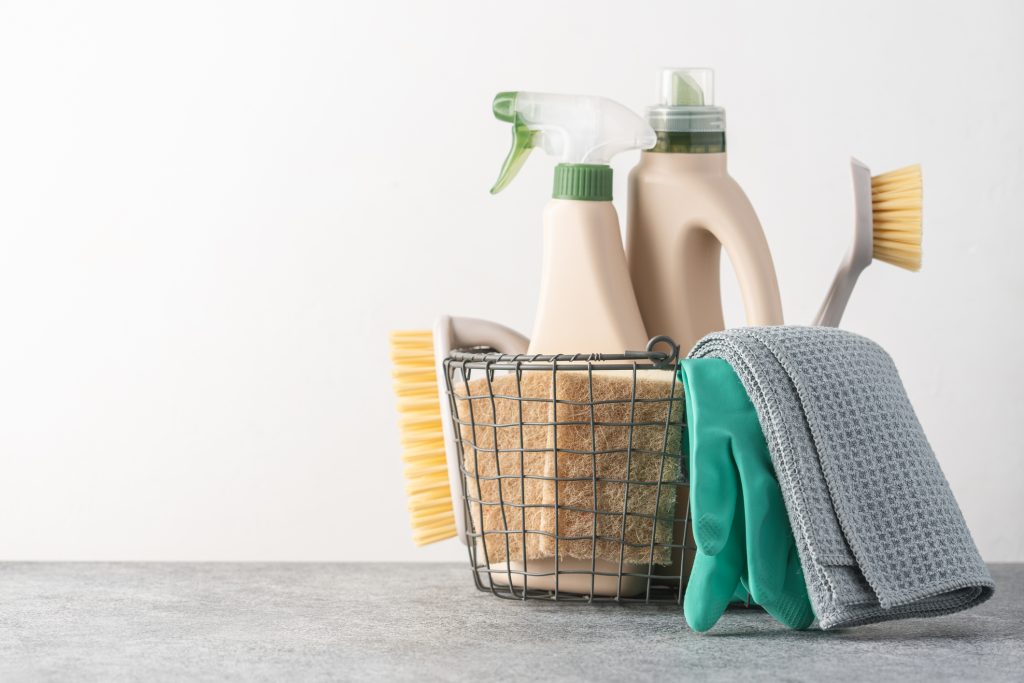 Basket of cleaning products and tools