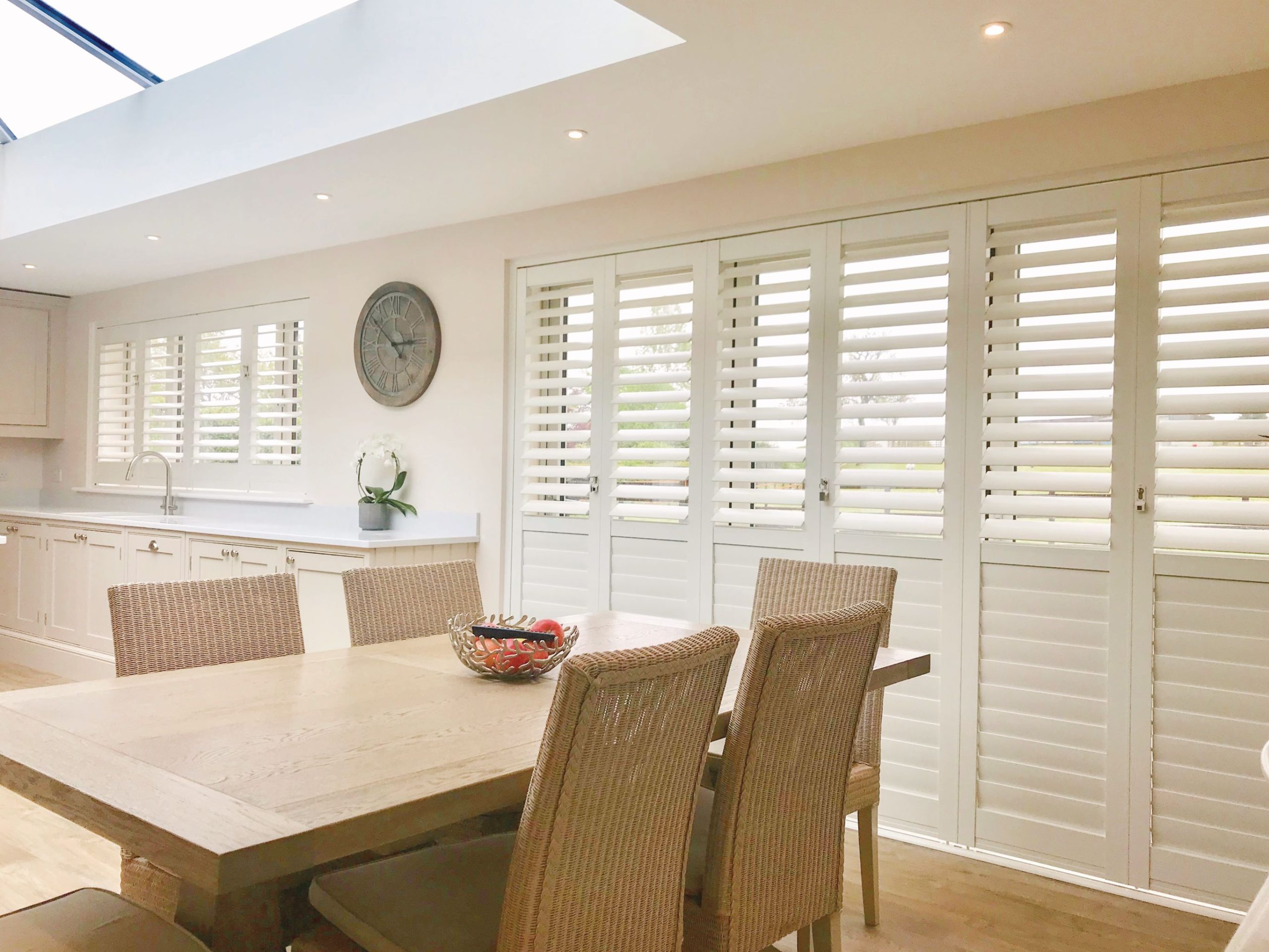 White shutters in dining room