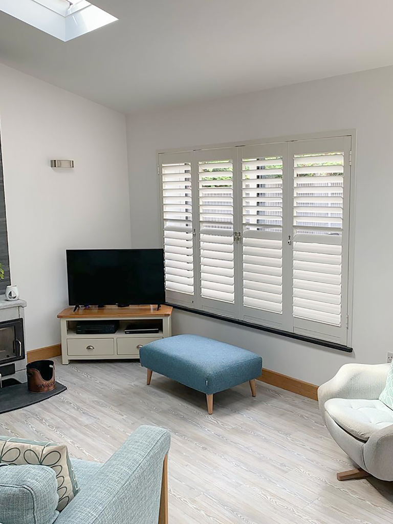 Full Height White Living Room Shutters